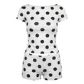 White t-shirt and shorts set with black polka dots on a white background